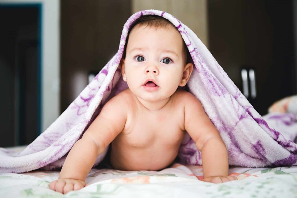 Coping:  baby komt onder dekentje vandaan